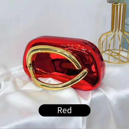 Red and gold Carauana Festival Clutch Bag 