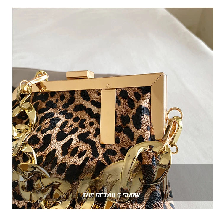 Carauana UNIU Leopard Clutch with gold chain detail