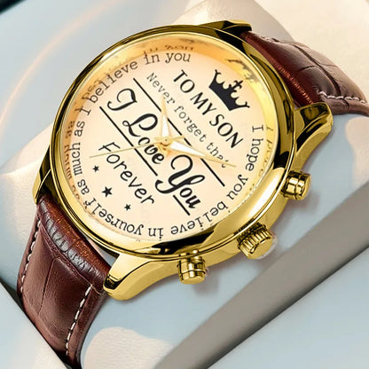 Gold watch with brown leather strap featuring engraved text To My Son