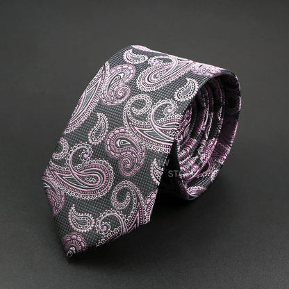 Paisley patterned tie on a dark background