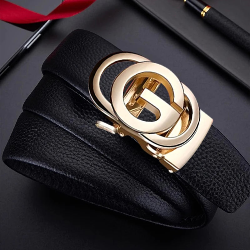 Black leather belt with a gold buckle on a dark surface