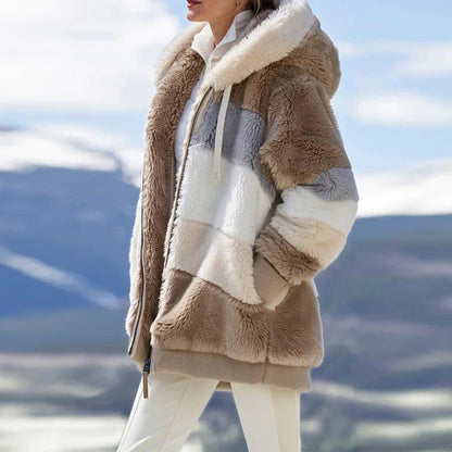 Person wearing a brown and beige sherpa jacket